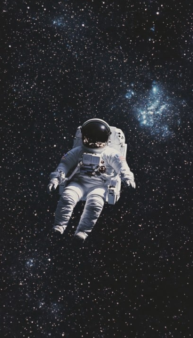 Astronaut drifting space